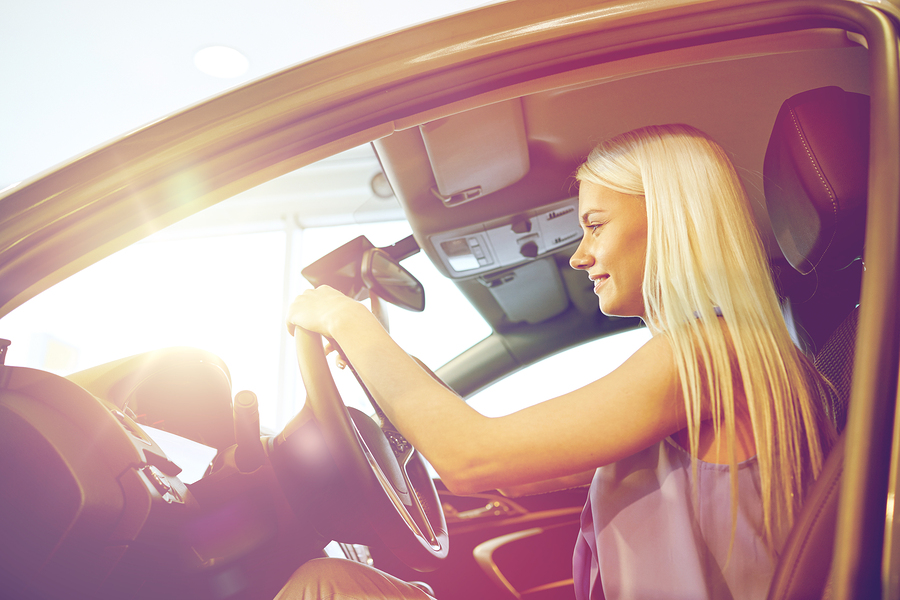 girl driving in the sun